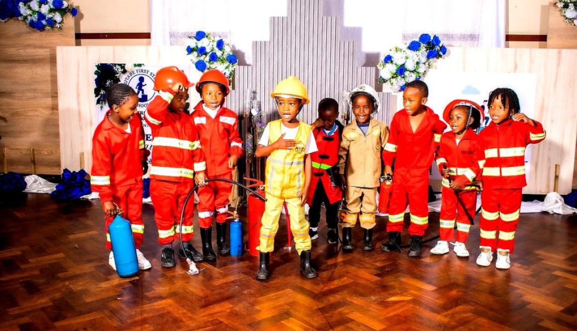 Learners dressed as firefighters during Career Day