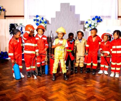 Learners dressed as firefighters during Career Day