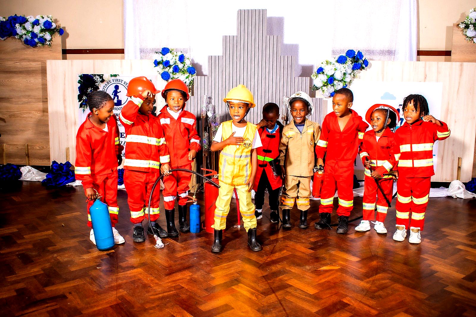 Learners dressed as firefighters during Career Day