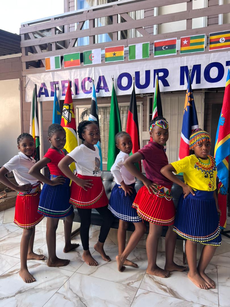 Learners wearing Zimbabwe’s national colours and traditional dress