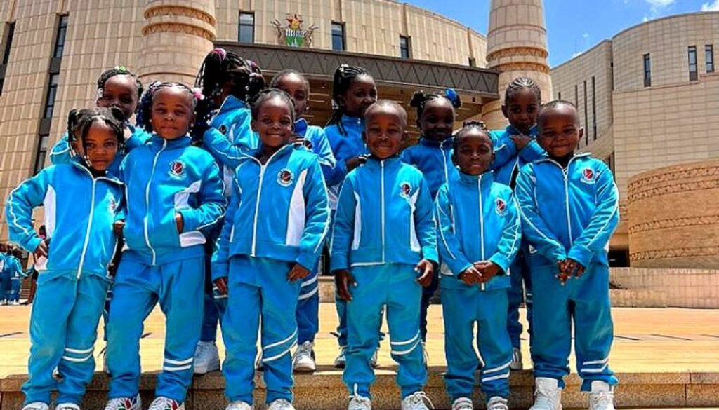 Learners in school tracksuits on a leadership visit